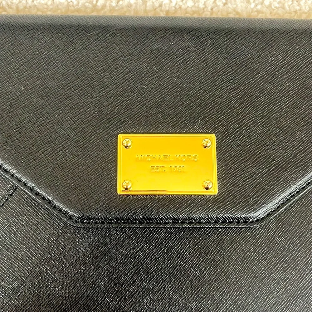 Michael Kors Tablet Case Black with card slots and pen holder.